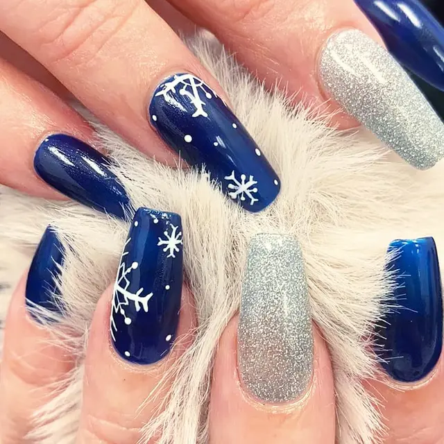 Elegant snowflakes Nail art done by me and gel extention by Kelly in