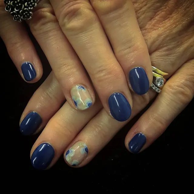 Nails matching with her dress, for her son's wedding.